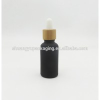 Frosted black oil bottle with bamboo dropper essential oil bottle